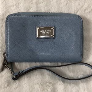 Michael Kors zip around wallet.